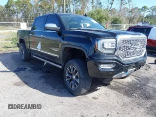 2017 GMC Sierra 1500 Denali with VIN 3GTU2PEJ7HG309560, listed as a IAAI auction lot 40764302 with 154,061 mi miles and . Bid and sale history available at DreamBid. Image 1.