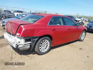 2013 Chrysler 300 with VIN 2C3CCAAG6DH613204, listed as a IAAI auction lot 42094988 with 193,481 mi miles. Bid and sale history available at carsss.com. Image 4.
