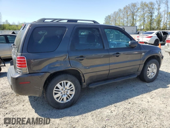 2005 Mercury Mariner Luxury z VIN 4M2CU57135DJ21208, wystawiony jako Copart lot #53555425 z przebiegiem 95 409 mil mil oraz Szkody całkowita. Historia ofert i sprzedaży dostępna na DreamBid. Obrazek 3.