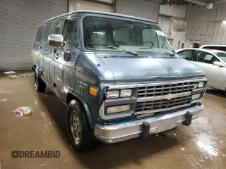 1995 Chevrolet Chevy Van z VIN 1GBEG25K2SF243949, wystawiony jako Copart lot #50422305 z przebiegiem 193 169 mil mil oraz Szkody całkowita. Historia ofert i sprzedaży dostępna na DreamBid. Obrazek 4.