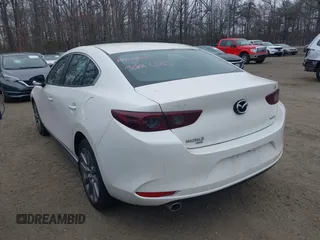 2021 Mazda 3 Select with VIN JM1BPBBL4M1340257, listed as a IAAI auction lot 41796721 with 24,861 mi miles and . Bid and sale history available at carsss.com. Image 3.