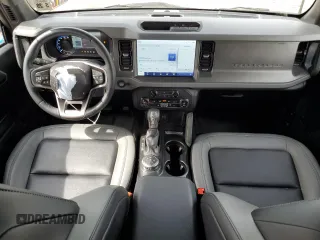 2024 Ford Bronco Big Bend z VIN 1FMDE7BH7RLA10353, wystawiony jako Copart lot #54209345 z przebiegiem 10 606 mil mil oraz Szkoda całkowita • Salvage title. Historia ofert i sprzedaży dostępna na DreamBid. Obrazek 8.