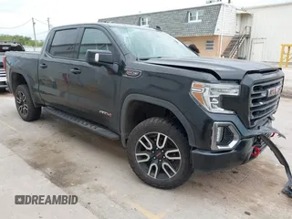 2021 GMC Sierra 1500 AT4 with VIN 3GTP9EEL9MG255509, listed as a IAAI auction lot 42354751 with 67,540 mi miles and . Bid and sale history available at DreamBid. Image 1.