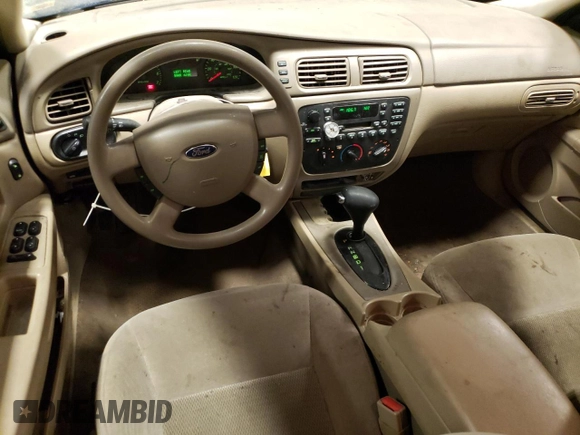 2004 Ford Taurus SE with VIN 1FAFP53U74G122231, listed as a Copart auction lot 42904044 with 116,851 mi miles and Salvage Title. Bid and sale history available at DreamBid. Image 8.
