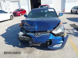 2016 Hyundai Veloster with VIN KMHTC6AD8GU302014, listed as a IAAI auction lot 41764406 with 102,893 mi miles. Bid and sale history available at carsss.com. Image 12.