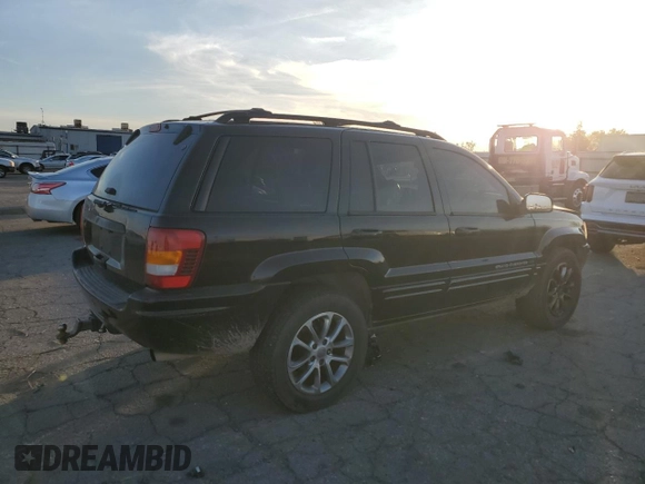 2001 Jeep Grand Cherokee Limited with VIN 1J4GX58S01C652737, listed as a Copart auction lot 81635494 with 175,498 mi miles and Salvage Title. Bid and sale history available at DreamBid. Image 3.