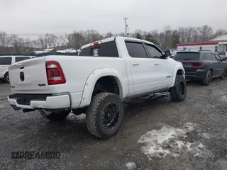2023 Ram 1500 Laramie with VIN 1C6SRFJT3PN519364, listed as a IAAI auction lot 41553431 with 23,541 mi miles and . Bid and sale history available at DreamBid. Image 4.