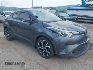 2018 Toyota C-HR XLE z VIN NMTKHMBX3JR009064, wystawiony jako IAAI lot #42095817 z przebiegiem 105 467 mil mil oraz . Historia ofert i sprzedaży dostępna na DreamBid. Obrazek 1.