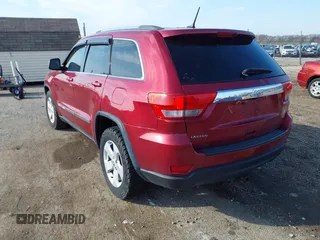 2013 Jeep Grand Cherokee Laredo with VIN 1C4RJEAG9DC538259, listed as a IAAI auction lot 41832676 with 143,000 mi miles. Bid and sale history available at carsss.com. Image 3.