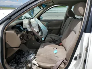 2000 Toyota Camry CE с VIN JT2BG22K1Y0403018, выставлен на аукционе Copart как лот 58325535 с пробегом Не указан миль и На запчасти • Non repairable. История ставок и продаж доступна на DreamBid. Изображение 7.