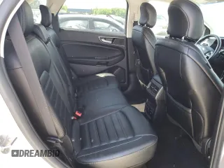 2019 Ford Edge SEL z VIN 2FMPK4J98KBB34524, wystawiony jako Copart lot #57313615 z przebiegiem 112 193 mil mil oraz Szkoda całkowita • Salvage title. Historia ofert i sprzedaży dostępna na DreamBid. Obrazek 11.