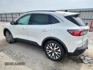 2020 Ford Escape Titanium z VIN 1FMCU9J91LUB53076, wystawiony jako Copart lot #64008765 z przebiegiem Nie podano mil oraz Nie do naprawy • Non repairable. Historia ofert i sprzedaży dostępna na DreamBid. Obrazek 2.
