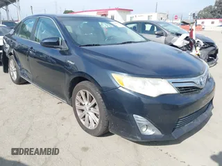 2012 Toyota Camry XLE z VIN 4T1BD1FK3CU002927, wystawiony jako IAAI lot #42030332 z przebiegiem 158 914 mil mil oraz . Historia ofert i sprzedaży dostępna na DreamBid. Obrazek 1.