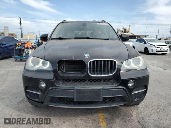 2012 BMW X5 35i z VIN 5UXZV4C51CL989449, wystawiony jako Copart lot #56762095 z przebiegiem 112 576 mil mil oraz Szkoda całkowita • Salvage title. Historia ofert i sprzedaży dostępna na DreamBid. Obrazek 5.