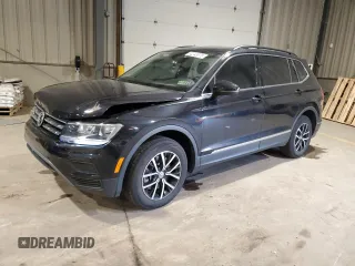 2021 Volkswagen Tiguan SE with VIN 3VV2B7AXXMM071024, listed as a Copart auction lot 52243675 with 31,448 mi miles and Salvage Title. Bid and sale history available at DreamBid. Image 1.
