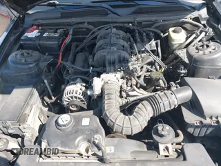 2005 Ford Mustang Deluxe with VIN 1ZVFT80N855159738, listed as a IAAI auction lot 42063276 with 214,063 mi miles. Bid and sale history available at carsss.com. Image 10.