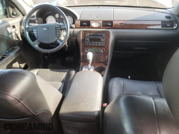 2005 Ford Five Hundred Limited with VIN 1FAFP251X5G152018, listed as a Copart auction lot 82747704 with 80,515 mi miles and Salvage Title. Bid and sale history available at carsss.com. Image 8.
