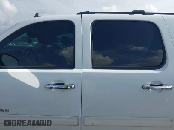 2011 Chevrolet Suburban LT with VIN 1GNSCJE09BR150452, listed as a IAAI auction lot 42655961 with 208,311 mi miles and . Bid and sale history available at DreamBid. Image 14.
