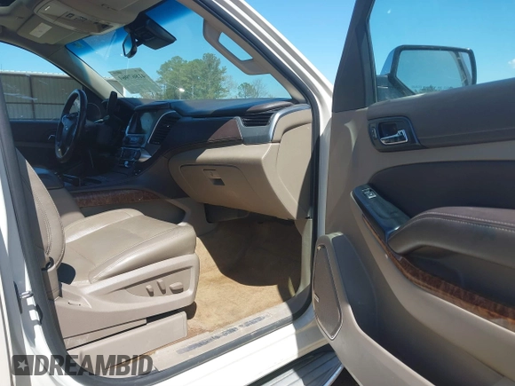 2015 Chevrolet Suburban LTZ with VIN 1GNSCKKC3FR113388, listed as a IAAI auction lot 41867964 with 238,530 mi miles and . Bid and sale history available at DreamBid. Image 5.