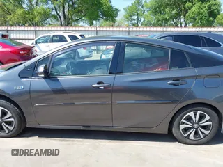 2018 Toyota Prius Plus with VIN JTDKARFP0J3101473, listed as a IAAI auction lot 41857956 with 110,020 mi miles and . Bid and sale history available at DreamBid. Image 15.