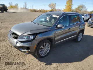 2017 Volkswagen Tiguan with VIN WVGMV7AX7HK034231, listed as a Copart auction lot 77844974 with 25,514 mi miles and Salvage title. Bid and sale history available at DreamBid. Image 1.