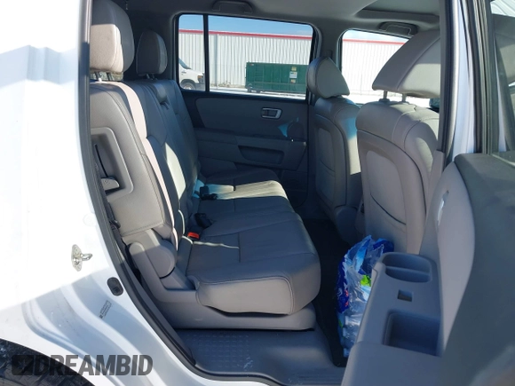 2013 Honda Pilot EX-L with VIN 5FNYF4H79DB086426, listed as a IAAI auction lot 41572456 with 190,745 mi miles and . Bid and sale history available at DreamBid. Image 8.