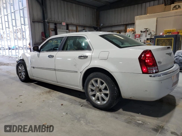 2010 Chrysler 300 with VIN 2C3CA6CT8AH329985, listed as a Copart auction lot 84556624 with 165,348 mi miles and Salvage Title. Bid and sale history available at carsss.com. Image 2.