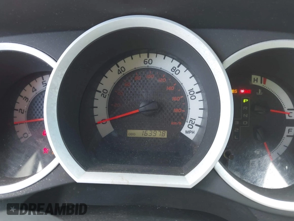 2014 Toyota Tacoma PreRunner with VIN 5TFJX4GN4EX032845, listed as a IAAI auction lot 41915723 with 163,978 mi miles and . Bid and sale history available at DreamBid. Image 7.