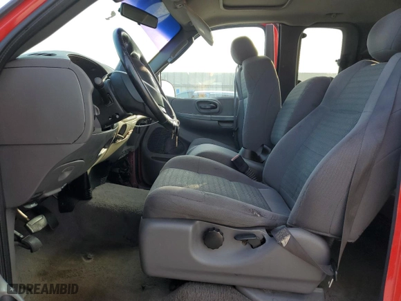 2002 Ford F-150 XL with VIN 2FTRX07WX2CA98348, listed as a Copart auction lot 43705135 with 204,718 mi miles and Salvage Title. Bid and sale history available at carsss.com. Image 7.