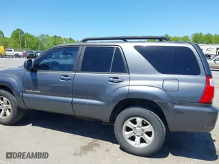2006 Toyota 4Runner SR5 with VIN JTEBU14R668060785, listed as a IAAI auction lot 42072120 with 232,129 mi miles. Bid and sale history available at carsss.com. Image 14.