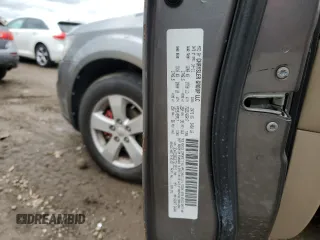 2012 Dodge Journey SXT z VIN 3C4PDCBG3CT213515, wystawiony jako Copart lot #58128845 z przebiegiem 208 152 mil mil oraz Szkoda całkowita • Salvage title. Historia ofert i sprzedaży dostępna na DreamBid. Obrazek 12.