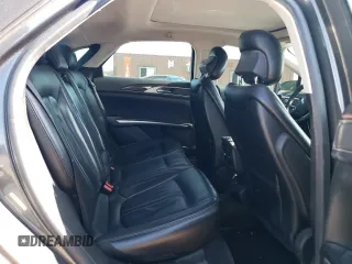 2015 Lincoln MKZ Hybrid z VIN 3LN6L2LU2FR607548, wystawiony jako Copart lot #61922775 z przebiegiem 255 797 mil mil oraz Szkoda całkowita • Salvage title. Historia ofert i sprzedaży dostępna na DreamBid. Obrazek 10.