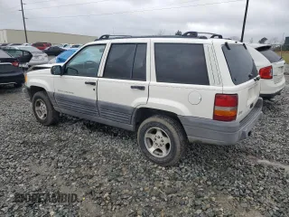 1997 Jeep Grand Cherokee TSi with VIN 1J4FX58S0VC578818, listed as a Copart auction lot 48463795 with 133,200 mi miles and Salvage Title. Bid and sale history available at carsss.com. Image 2.