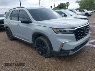 2024 Honda Pilot Touring z VIN 5FNYG1H71RB005034, wystawiony jako IAAI lot #42371878 z przebiegiem Nie podano mil oraz . Historia ofert i sprzedaży dostępna na DreamBid. Obrazek 1.