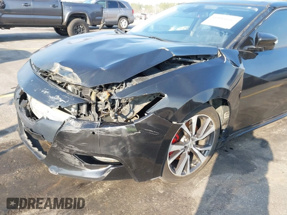 2016 Nissan Maxima SL z VIN 1N4AA6AP1GC383512, wystawiony jako IAAI lot #41490666 z przebiegiem 110 235 mil mil oraz . Historia ofert i sprzedaży dostępna na DreamBid. Obrazek 17.