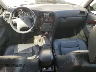 2000 Volvo V40 z VIN YV1VW2552YF568371, wystawiony jako Copart lot #53491375 z przebiegiem 66 631 mil mil oraz Szkody całkowita. Historia ofert i sprzedaży dostępna na DreamBid. Obrazek 8.