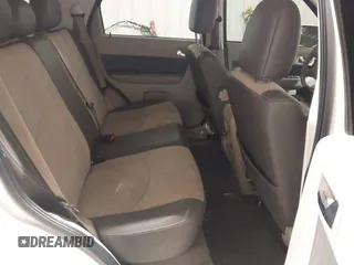 2011 Mercury Mariner Premier with VIN 4M2CN9HG3BKJ02026, listed as a IAAI auction lot 40254703 with 99,000 mi miles and . Bid and sale history available at DreamBid. Image 8.