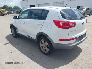 2012 Kia Sportage LX with VIN KNDPB3A2XC7237360, listed as a IAAI auction lot 42478625 with 122,824 mi miles and . Bid and sale history available at DreamBid. Image 3.