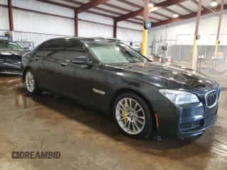 2014 BMW 7 Series ALPINA B7 xDrive with VIN WBAYF8C53ED652566, listed as a Copart auction lot 61177235 with 144,566 mi miles and Salvage title. Bid and sale history available at DreamBid. Image 4.