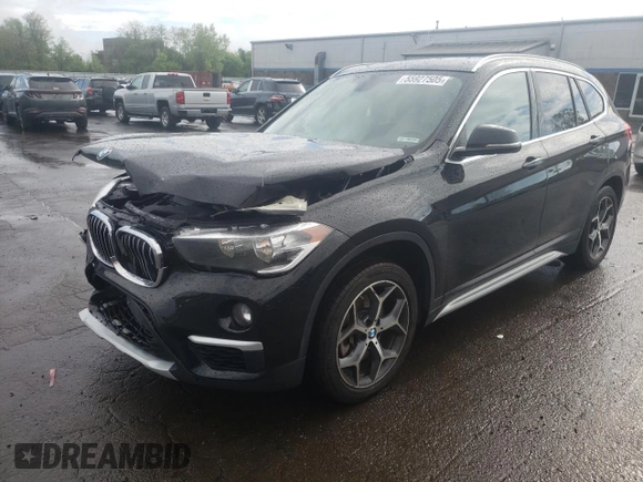 2018 BMW X1 xDrive28i with VIN WBXHT3C35J3H30946, listed as a Copart auction lot 55927505 with 69,626 mi miles and Salvage title. Bid and sale history available at DreamBid. Image 1.