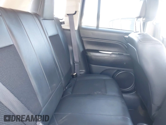 2016 Jeep Compass Latitude with VIN 1C4NJCEA3GD734883, listed as a IAAI auction lot 41340569 with 150,165 mi miles. Bid and sale history available at carsss.com. Image 8.