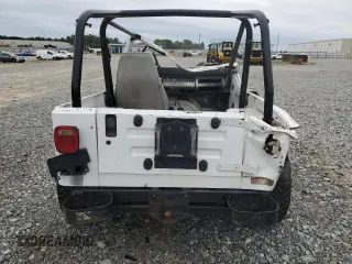 1990 Jeep Wrangler "S" with VIN 2J4FY19E6LJ528040, listed as a Copart auction lot 70989084 with 176,416 mi miles and Salvage Title. Bid and sale history available at carsss.com. Image 6.