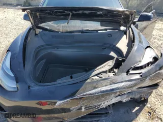 2021 Tesla Model 3 Standard Range Plus with VIN 5YJ3E1EA6MF067702, listed as a Copart auction lot 52048315 with 72,974 mi miles and Salvage Title. Bid and sale history available at carsss.com. Image 14.