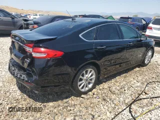 2017 Ford Fusion Hybrid SE with VIN 3FA6P0LU1HR266939, listed as a Copart auction lot 61018305 with 121,293 mi miles and Salvage title. Bid and sale history available at DreamBid. Image 3.