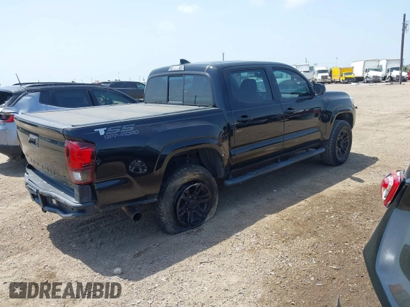 2018 Toyota Tacoma SR with VIN 5TFAX5GN5JX126118, listed as a IAAI auction lot 41949791 with 37,615 mi miles and . Bid and sale history available at DreamBid. Image 4.