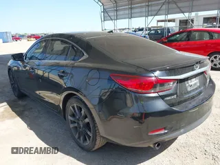 2015 Mazda 6 i Grand Touring with VIN JM1GJ1W59F1179548, listed as a IAAI auction lot 42004860 with 153,532 mi miles and . Bid and sale history available at DreamBid. Image 3.