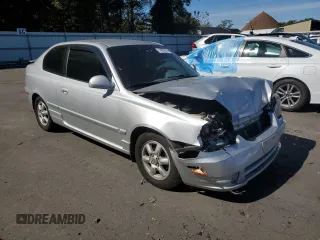 2005 Hyundai Accent GLS with VIN KMHCG35C05U331928, listed as a Copart auction lot 74672614 with 41,542 mi miles and Salvage Title. Bid and sale history available at carsss.com. Image 4.