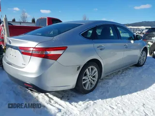 2013 Toyota Avalon XLE with VIN 4T1BK1EBXDU009947, listed as a IAAI auction lot 41562857 with 174,764 mi miles and . Bid and sale history available at DreamBid. Image 4.
