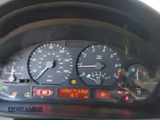 2002 BMW 3 Series 325i with VIN WBAEV33412KL55500, listed as a IAAI auction lot 42008308 with 172,852 mi miles. Bid and sale history available at carsss.com. Image 7.