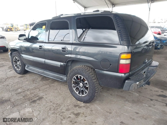 2003 Chevrolet Tahoe LS with VIN 1GNEC13T83R282176, listed as a IAAI auction lot 41815032 with 173,001 mi miles. Bid and sale history available at carsss.com. Image 3.